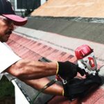 CN445R3 SuperRoofer Roofing Nailer being used