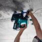 Makita GRH02M1W Action Shot 4 (overhead drilling with light)